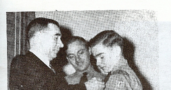 1946 Mr. Mohan pinning Eagle Badge on son